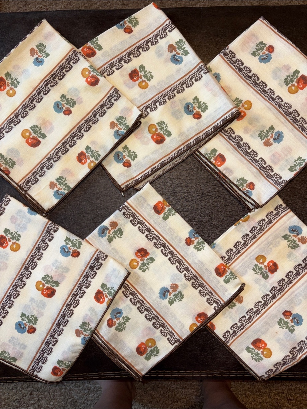 A pack of 6 vintage 1970's flower cloth napkins